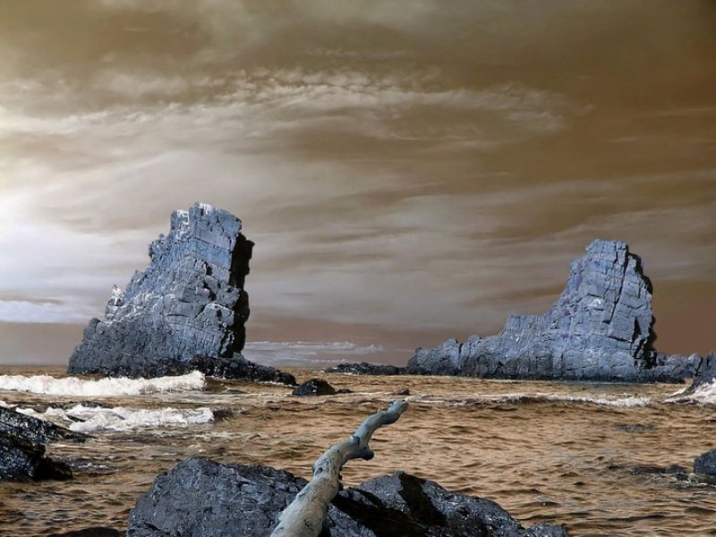 Rock Formations in Ocean — Brown