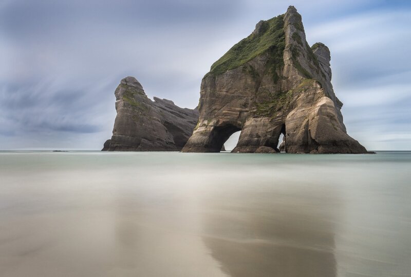 Rock Formations in Ocean — Gray, Serene, Photograph