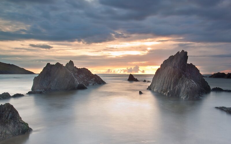 Rock Formations in Ocean — Gray, Serene