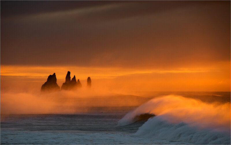 Rock Formations in Ocean — Orange, Dramatic