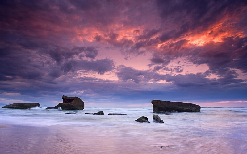 Rock Formations in Ocean — Purple, Dramatic, Sunset