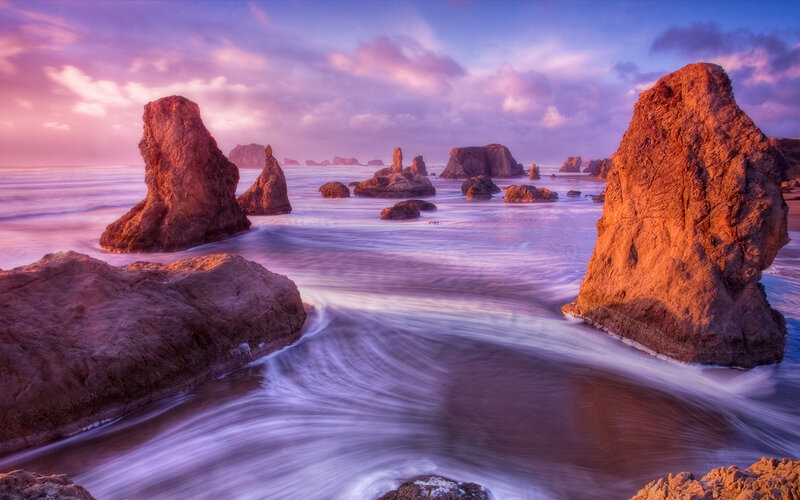 Rock Formations in Ocean — Purple, Serene, Sunset, Photograph