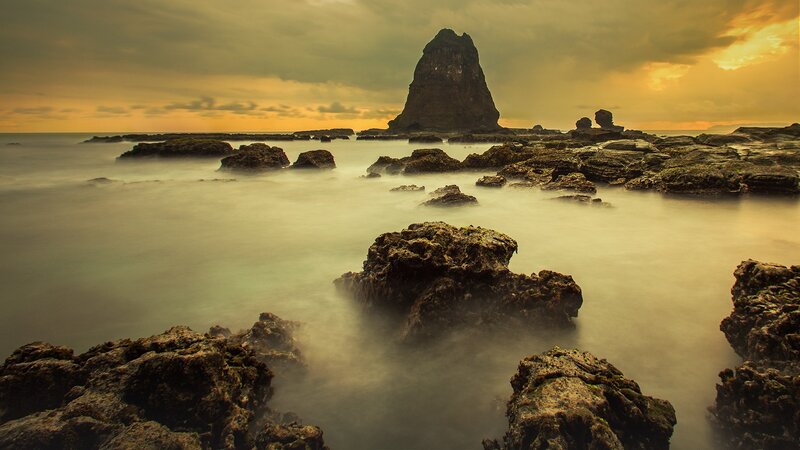 Rock Formations in Ocean — Yellow