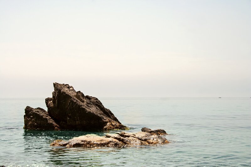 Rock Formations in Sea — Blue, Calm