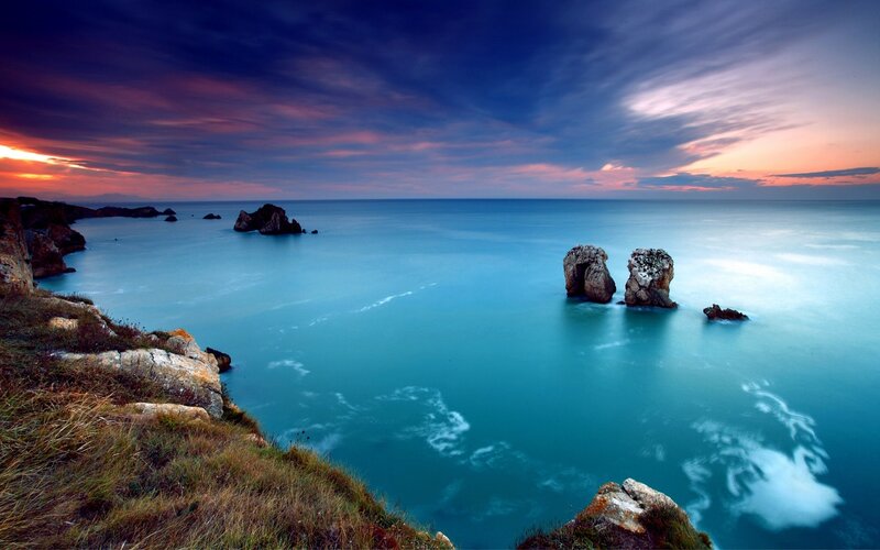 Rock Formations in Sea — Blue, Dramatic, Sunset, Photograph