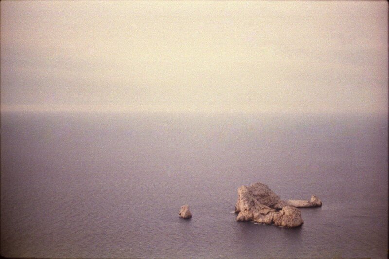 Rock Formations in Sea — Gray, Calm