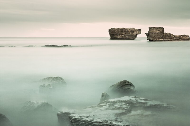 Rock Formations in Sea — Gray, Serene