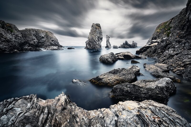 Rock Formations in Sea — Gray