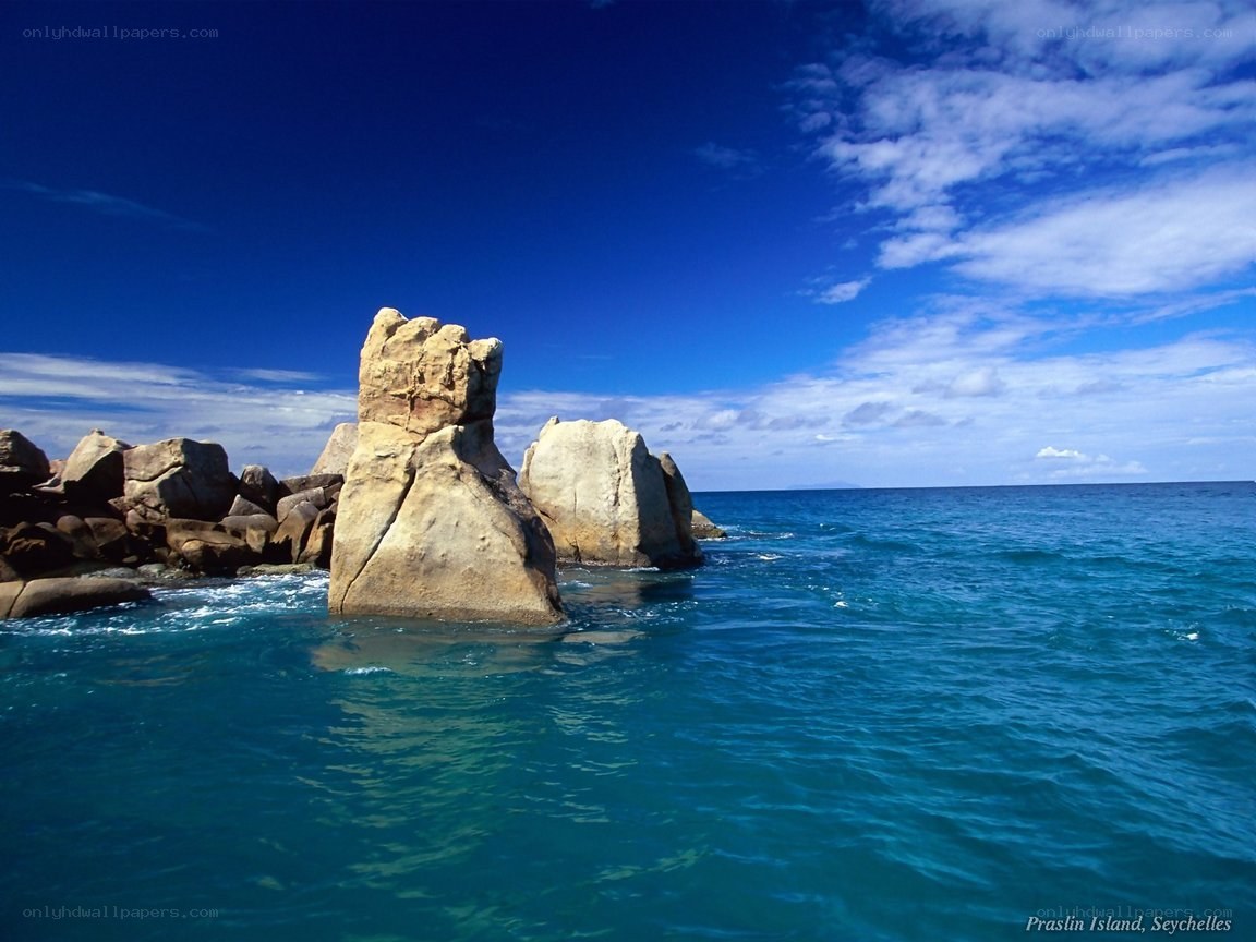 Rock formations in turquoise water