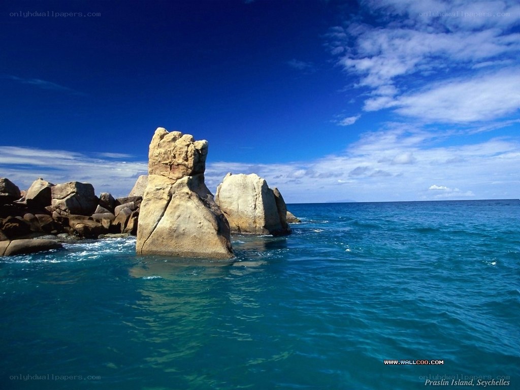 Rock formations in turquoise water
