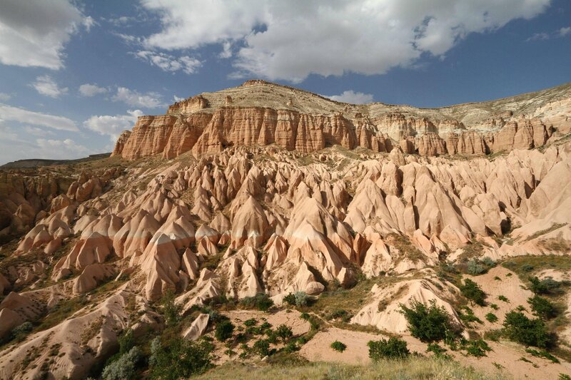 Rock Formations in Valley — Brown