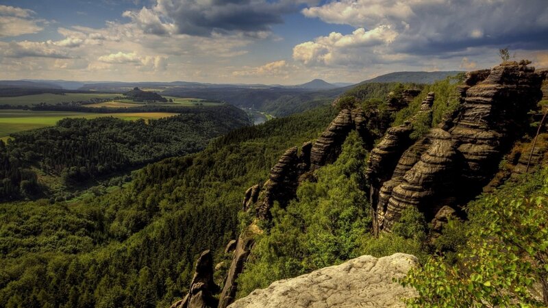 Rock Formations in Valley — Green, Dramatic