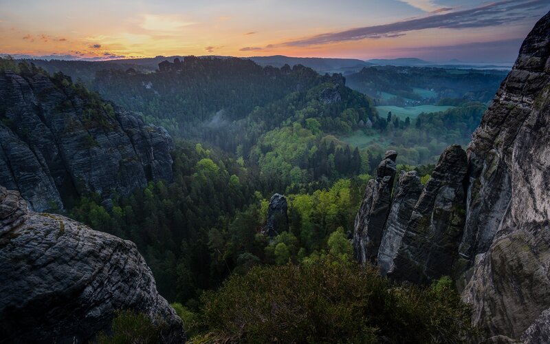 Rock Formations in Valley — Green, Serene
