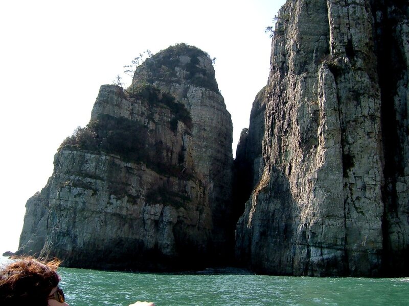 Rock Formations in Water — Gray, Dramatic