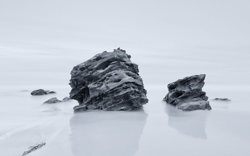 Rock Formations in Water — Gray, Serene