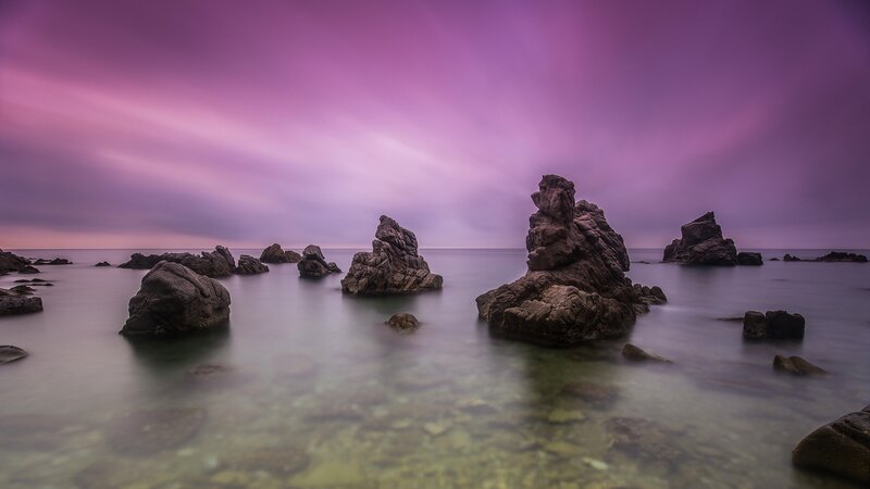 Rock Formations in Water — Purple, Serene