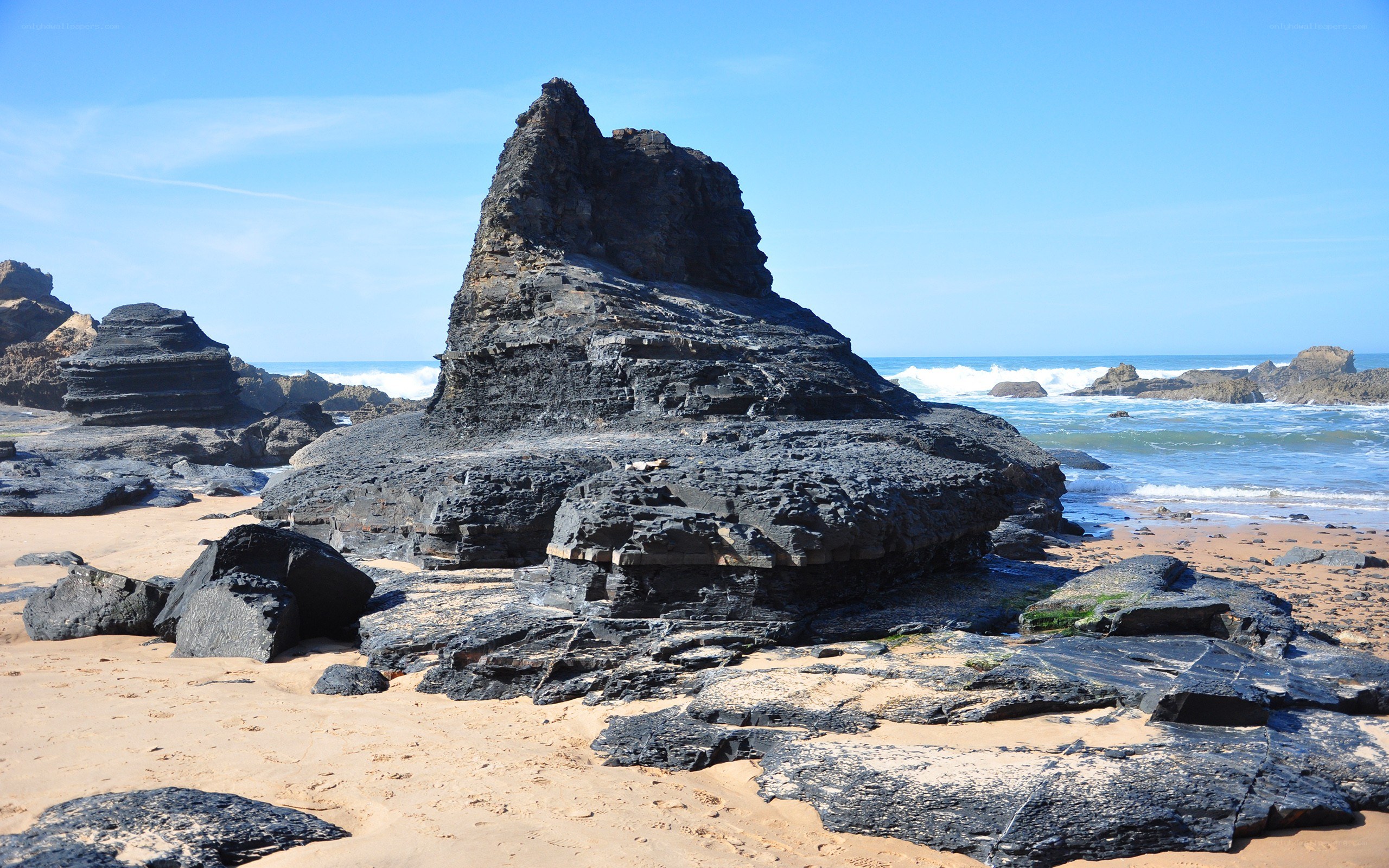 Rock formations on a sandy beach