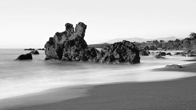 Rock Formations on Beach — Black, Serene