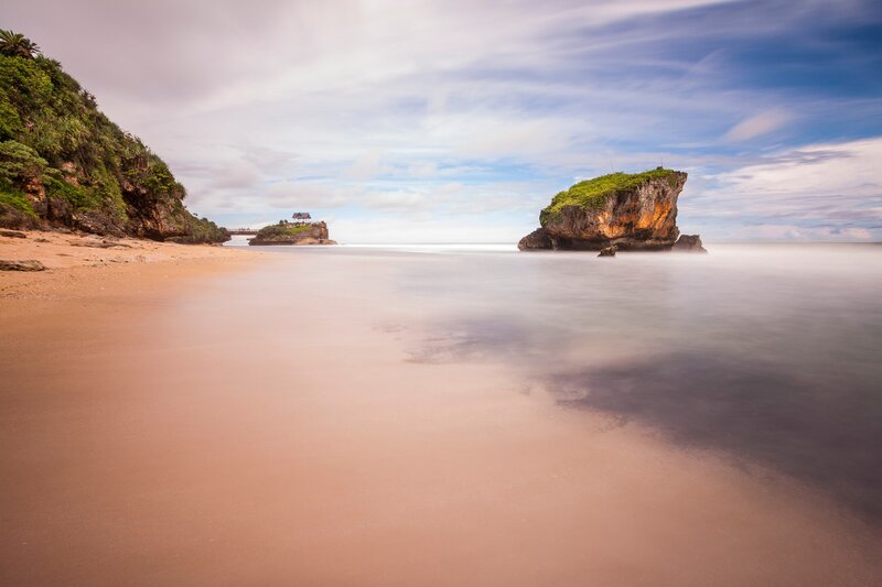 Rock Formations on Beach — Blue, Serene, Afternoon, Photograph, Sea, Cliff