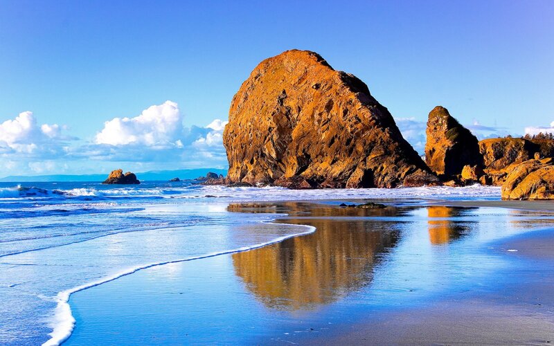 Rock Formations on Beach — Blue
