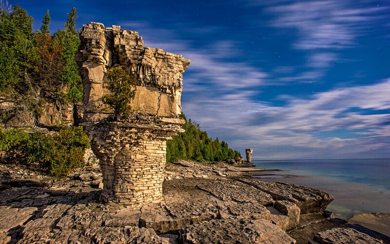 Rock Formations on Coast — Blue