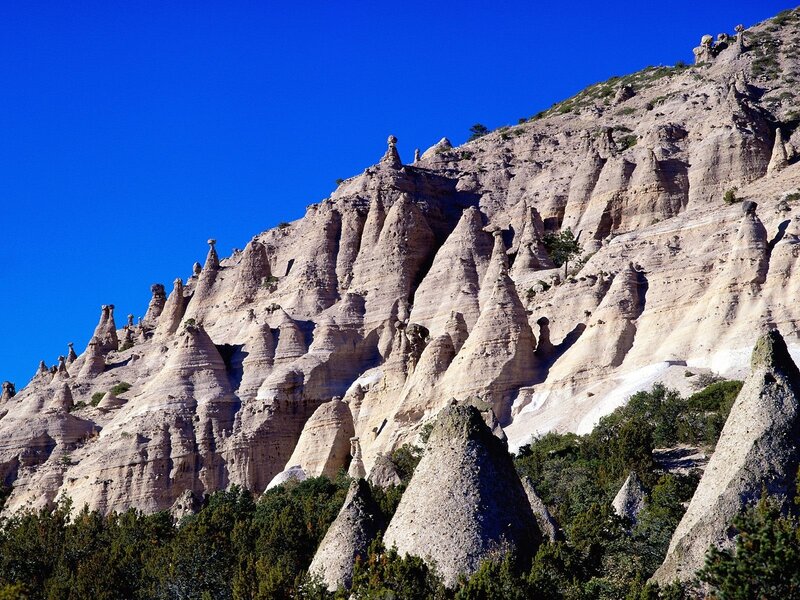 Rock Formations on Hillside — Blue