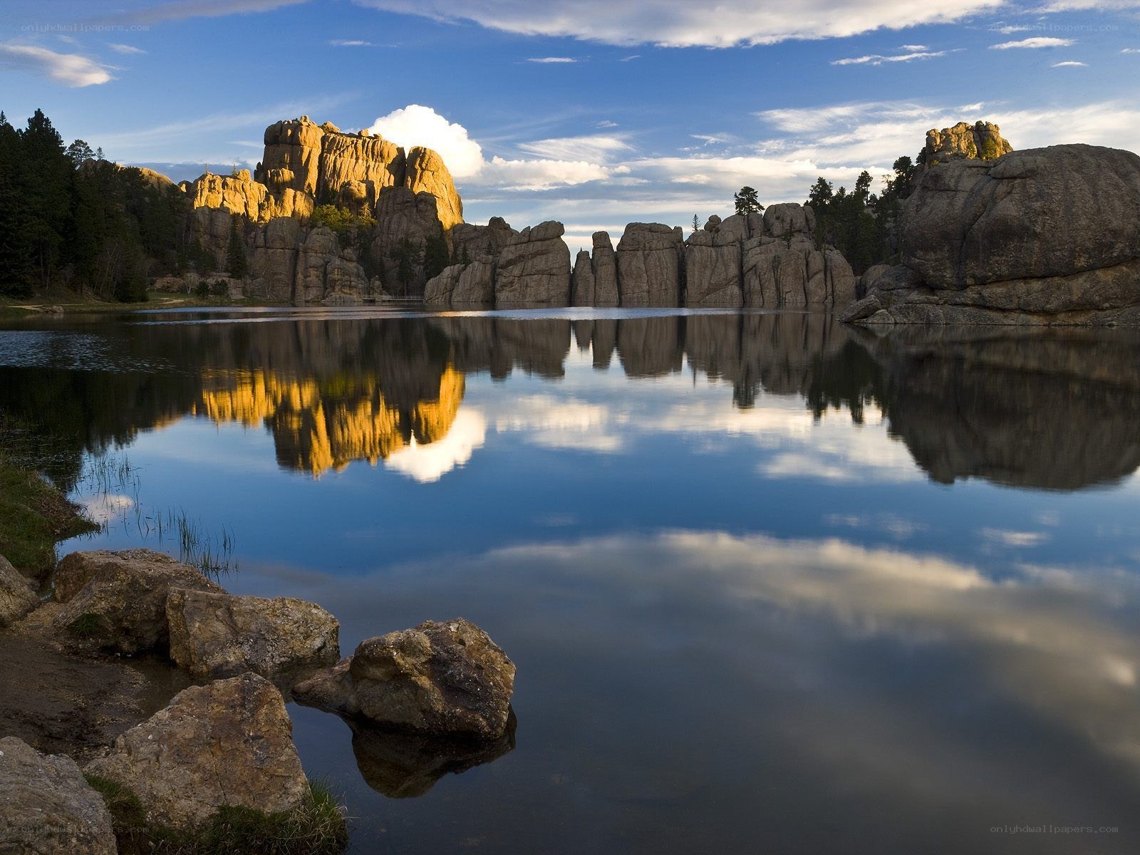 Rock formations reflected in lake