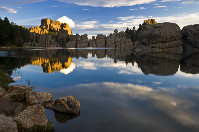 Rock formations reflected in lake