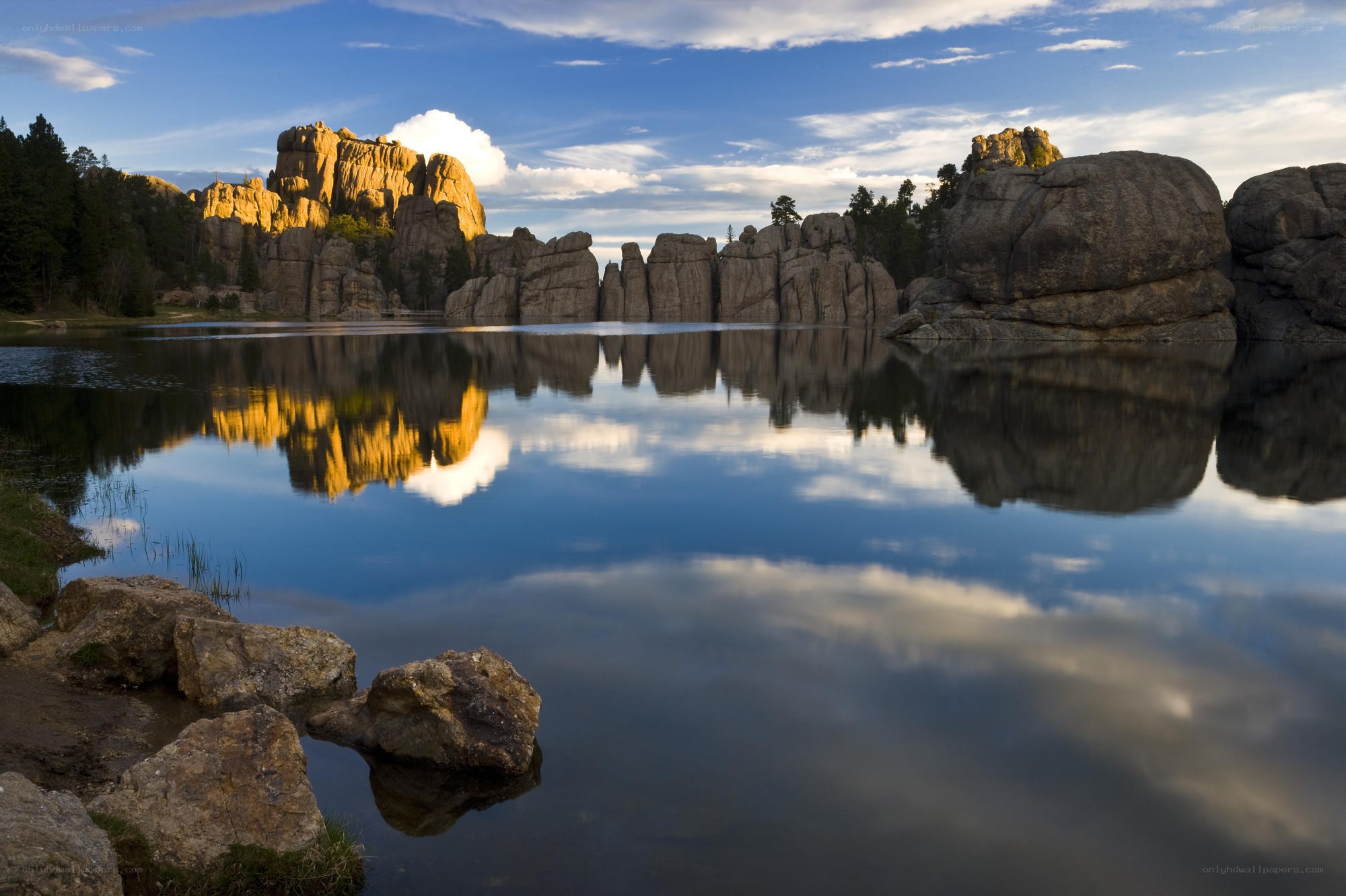 Rock formations reflected in lake