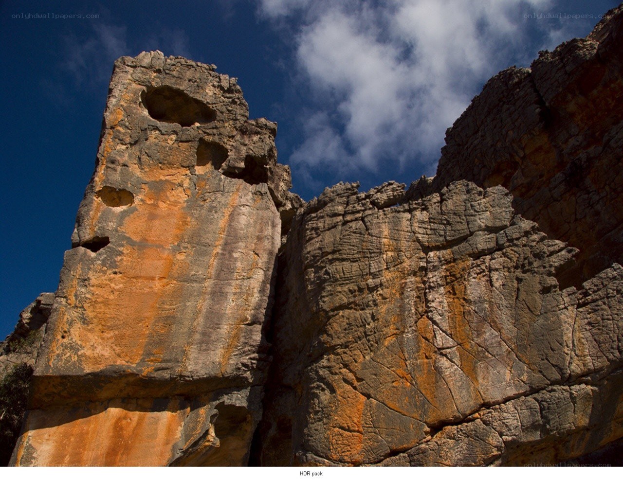 Rock formations under blue sky