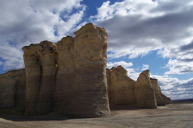 Rock formations under cloudy sky