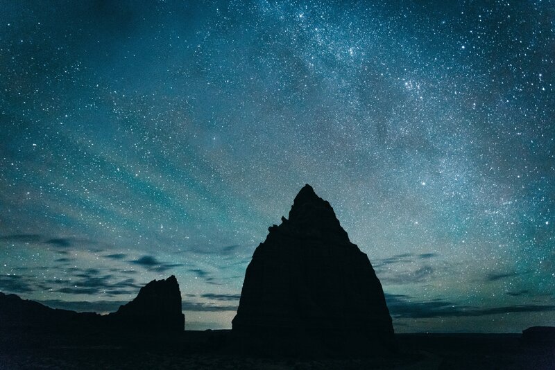 Rock Formations under Stars — Blue, Serene, Night, Photograph, Clouds