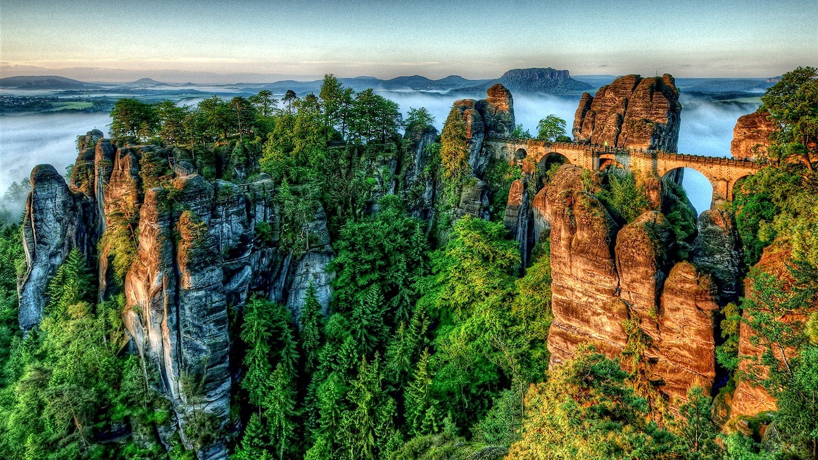 rock formations with bridge