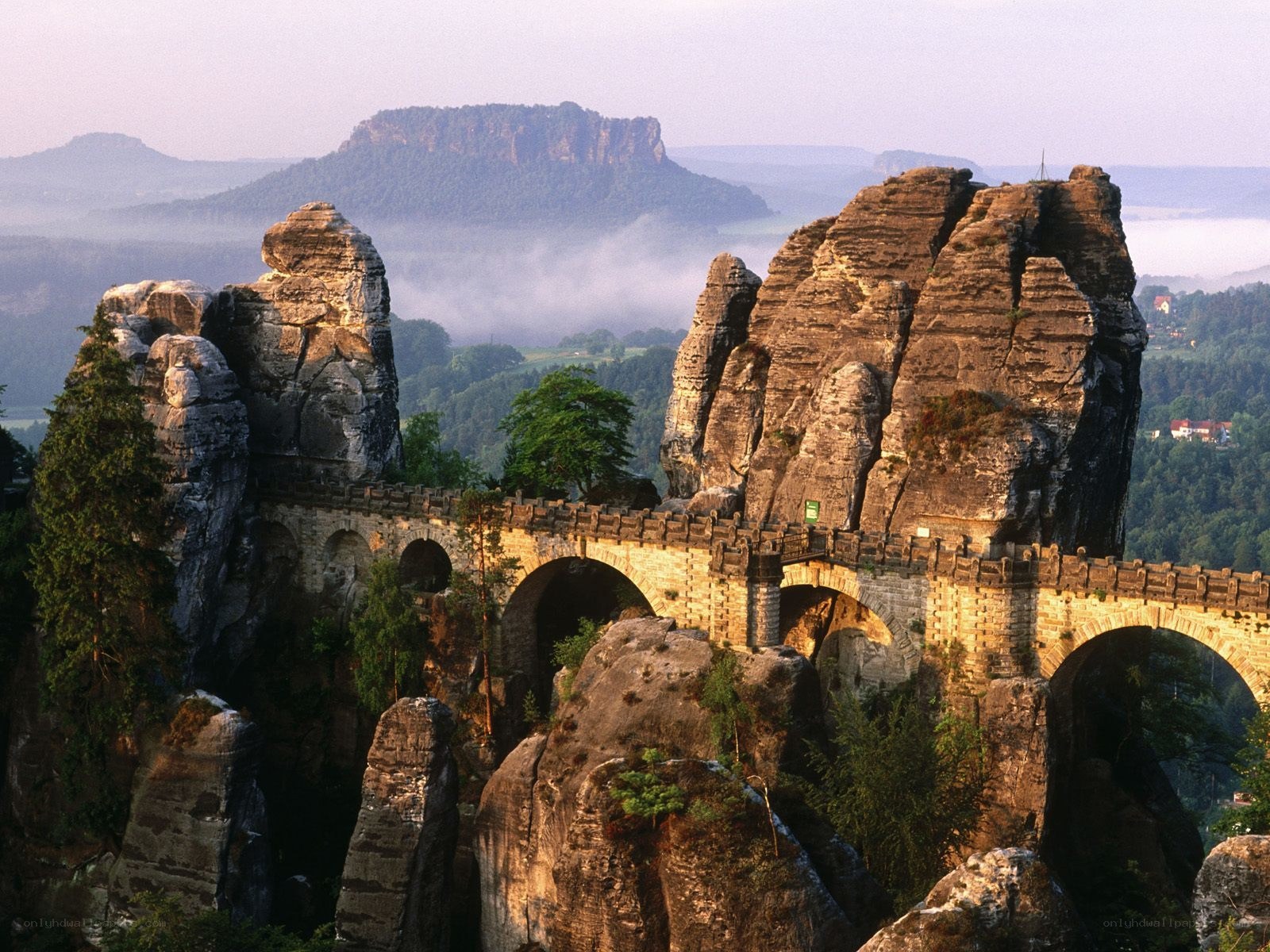 rock formations with stone bridge