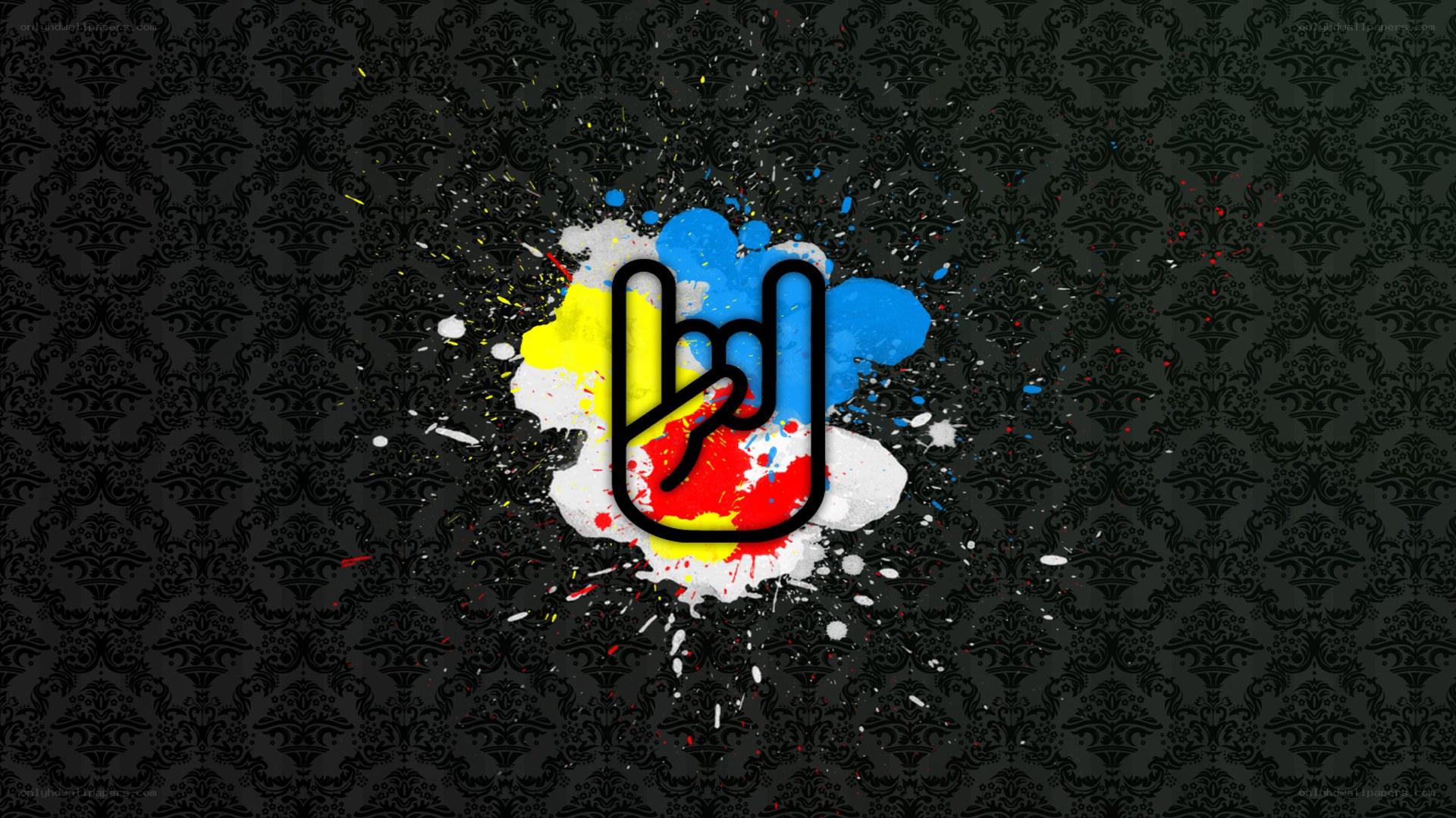 rock hand gesture with paint splatter