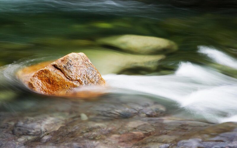 Rock in a flowing stream