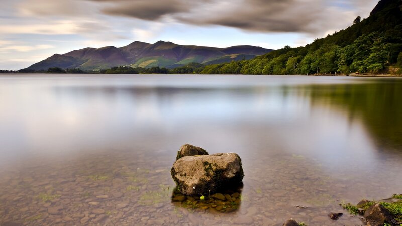 Rock in Calm Lake — Blue, Serene, Afternoon, Photograph