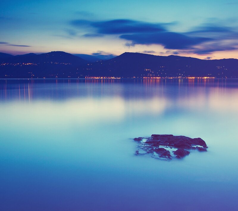 Rock in Calm Water — Blue, Serene, Night, Photograph, Mountains