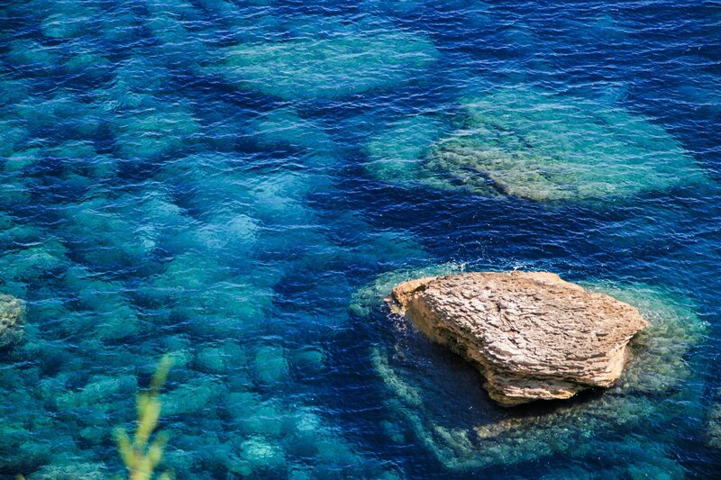 Rock in Clear Blue Water