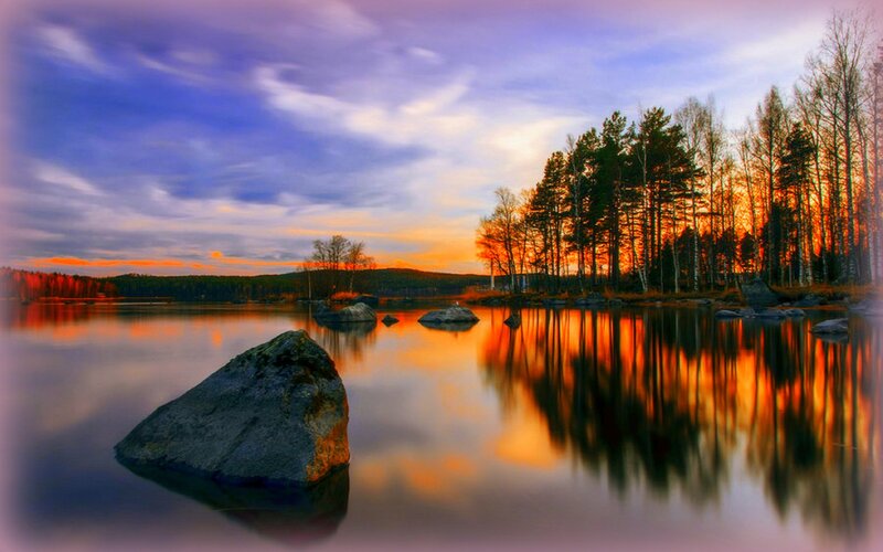 Rock in Lake at Sunset