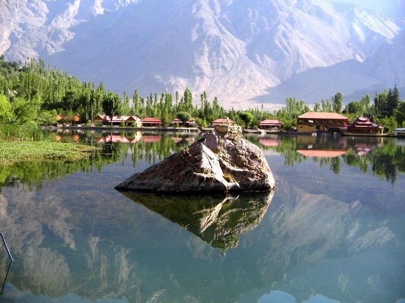 Rock in Lake with Mountains — Blue