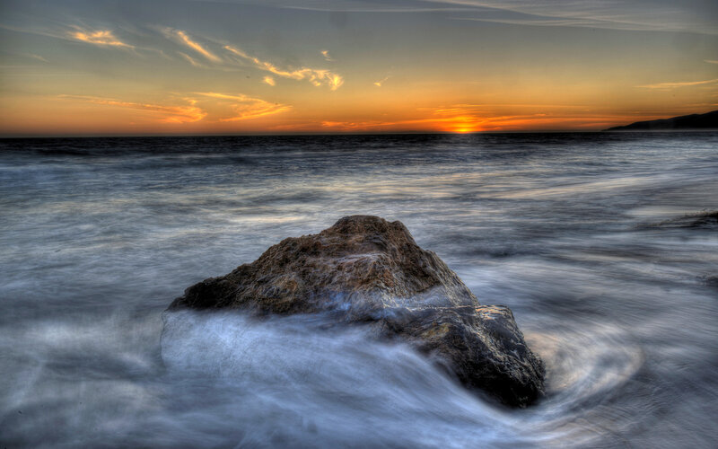 Rock in Ocean at Sunset — Orange