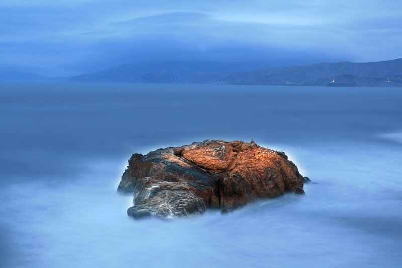 Rock in the Sea at Dusk