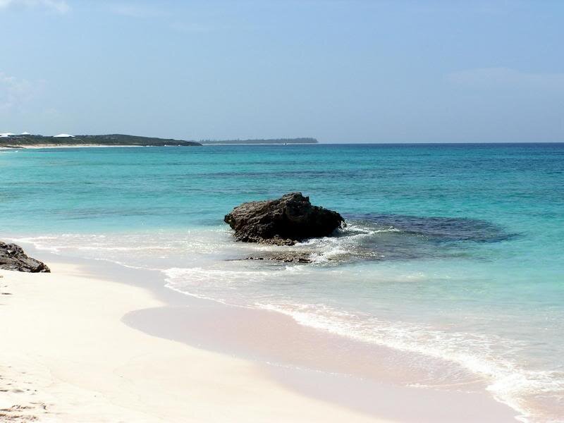 Rock in Turquoise Water — Blue