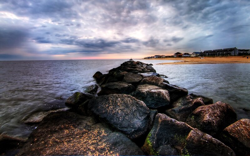 Rock jetty at coastal town