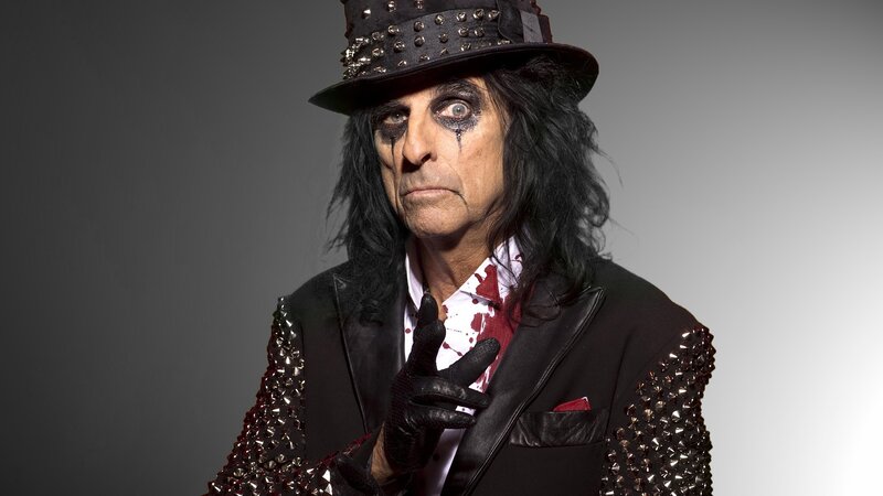 rock musician in studded outfit