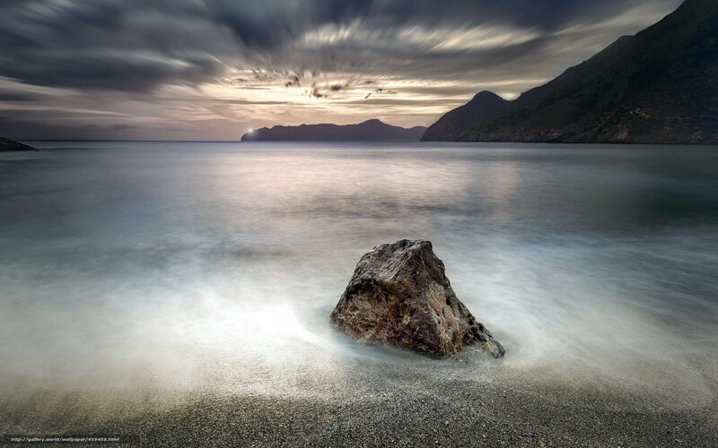 Rock on a tranquil beach