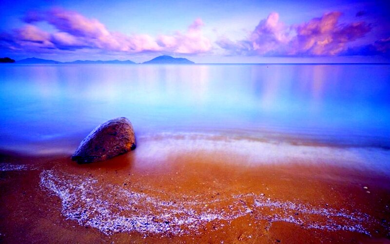 Rock on Beach at Dusk