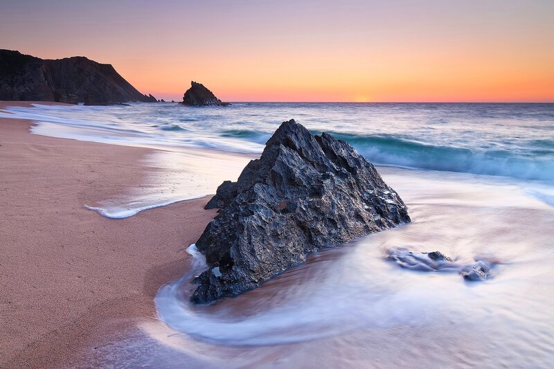 Rock on Beach at Sunset — Orange