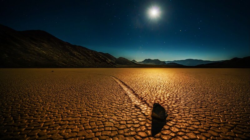 Rock on Cracked Desert